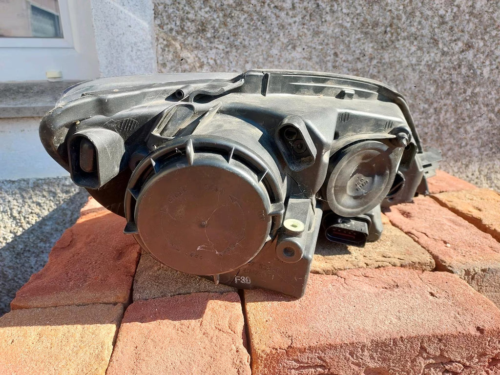 Golf plus left headlight